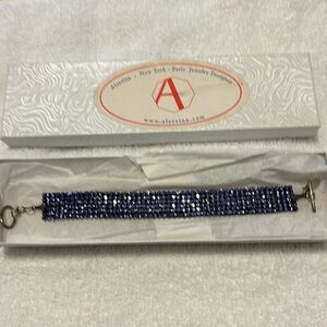 Swarovski Alzerina New York, Paris, jewelry designer,  blue bracelet 7.5 inches